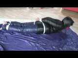 Get a Video with Alina enjoying Bondage in her shiny nylon Downwer from our 2011 Archive