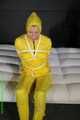 Get Pictures of Pia bound and gagged in her yellow shiny nylon Rainwear