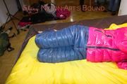 Lucy tied and gagged with a pillory wearing a sexy blue down pants and a pink down jacket (Pics)