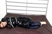 Shelly tied and gagged in a shiny nylon downcoat