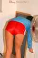 SEXY ENNI wearing a hot red shiny nylon shorts and a lightblue shiny nylon rain jacket during ironing the shirt of her boyfriend (Pics)