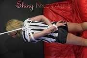 Sexy Pia wearing a sexy black shiny nylon shorts and a top being tied and gagged with ropes and a cloth gag overhead (Pics)