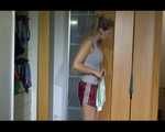 Sexy Sandra examine the cupboard with shiny nylon shorts and posing in shiny nylon shorts and a top (Video)