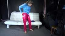 Watching sexy Sandra dressing her up with a new red shiny nylon rain pants and a blue rain jacket lolling, posing and enjoying herself in this cloth (Video)