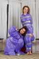 Terry and Vanessa - Terry in raincoat is taped and teased by Vanessa