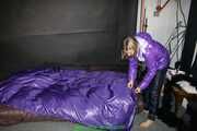Watch Maly enjoying her shiny nylon Downjacket in her shiny nylon Bed