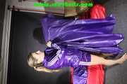 Sandra preparing her shiny nylon bed wearing sexy purple shiny nylon shorts and a purple shiny nylon rain jacket (Pics)