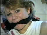 22 YR OLD LISA IS TIED WITH  RAWHIDE, CLEAVE GAGGED, HANDGAGED & TAPE GAGGED (D33-8)