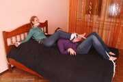 Catt and Alexa - Naughty girl tied up before joining helpless girlfriend on the bed