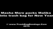 [From archive] Masha More & Malika - Masha More packs Malika into trash bag for new year (video)