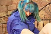 Mara tied and gagged on a princess bed in an old cellar wearing an supersexy shiny green nylon shorts and a blue rain jacket (Pics)