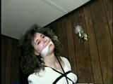 ERICA IS RING GAGGED, MOUTH STUFFED, CLEAVE GAGGED & TIED WITH BLACK NYLON ROPE (D36-10)