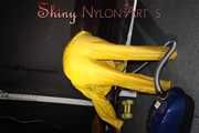 Watching sexy Sandra wearing a hot yellow shiny nylon rainwear combination during her housework (Pics)