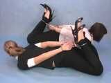 Alexa and Catt - Sweet blonde demonstrates her tied up friend how to use cuffs (video)
