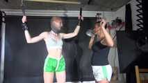 ***RONJA*** being tied and gagged overhead with ropes and a special combination of nylon over head and tape gagg from STELLA both wearing sexy shiny nylon shorts and tops (Video)