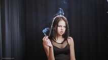 18 years old Tanya is smoking 120mm cigarette