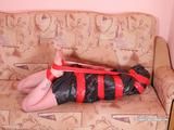 [From archive] Liska overhead trash bag packed with red duct tape