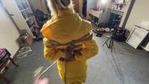 Ms Ungeniert tied, gagged and hooded in shiny nylon yellow Downjacket