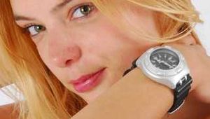 Eva wearing two Swatch Irony Scuba watches