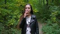 Cute smoker Ksenia enjoys her walk with a cigarette 