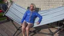 SEXY Sonja wearing sexy shiny nylon shorts enjoying the sun and the shorts in a hammock (Video)