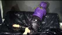 Sandra tied and gagged on a sofa wearing a shiny nylon down jacket and a rain pants (Video)