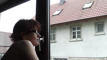 Cum swallowing at the window
