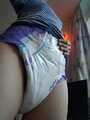My lavender diaper and blue romper