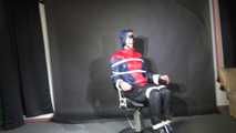 Watzching sexy PIA wearing a sexy oldschool rainwear combination in red/blue sitting on a hairdresser´s chair being tied and gagged from Sophie (Video)