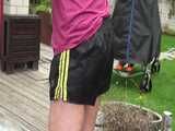 Watch Pia having fun outdoors with her shiny nylon Shorts