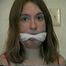 24 Yr OLD CRAFTER IS CLEAVE GAGGED, MOUTH STUFFED, HAND GAGGED, OTM GAGGED & TIED TO A CHAIR (D55-6)