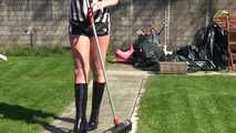 Watching Pia sweeping the terrace wearing a sexy black shiny nylon shorts, a striped top and black rubber boots (Video)