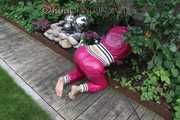 Watching Aiyana wearing supersexy pink shiny nylon rainwear while planting flowers in the garden (Pics)