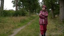 Miss Petra takes a walk in an AGU rain suit and rubber boots