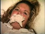 BBW MICHELLE IS MOUTH STUFFED, HANDGAGGED, CLEAVE GAGGED WITH VET TAPE & BAREFOOT TIED (D56-16)
