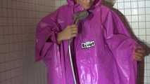 Watching Sandra wearing only a pink shiny nylon raincape under the shower playing with the water (Video)