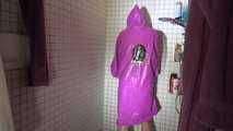 Watching Sandra wearing only a pink shiny nylon raincape under the shower playing with the water (Video)