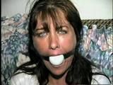 38 Yr OLD CASHIER IS MOUTH STUFFED, CLEAVE GAGGED, BALL-GAGGED, BAREFOOT, TOE-TIED, BLINDFOLDED & HANDGAGGED (D57-15)