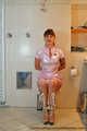 Our new model Miss Clara dressed as a PVC nurse getting in trouble
