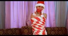 Bekki - Mummified for Christmas in red and white tape (video)