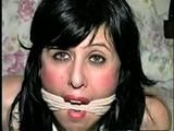 40 Yr OLD HAIRDRESSER CHER IS MOUTH STUFFED, ACE BANDAGE CLEAVE GAGGED, BALL-TIED, & HANDGAGGED (D56-2)