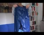 Jill folding shiny nylon clothes wearing shiny nylon clothes (Video) 