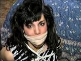 35 YEAR OLD ITALIAN HAIRDRESSER IS MOUTH STUFFED, HANDGAGGED, WRAP ACE BANDAGE GAGGED, BALL-TIED, HOG-TIED, DUCT TAPE GAGGED WHILE LAYING ON THE FLOOR (D65-13)