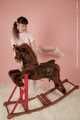 I am rocking my rocking horse in my diaper