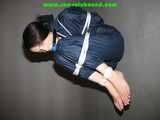 Get 101 Pictures with Lupi tied and gagged in shiny nylon rainwear from 2005-2008!