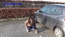 078014 Rachel Evans Pees Beside Her Car