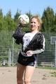 Leonie playing soccer outdoor wearing a sexy black shiny nylon shorts and a sexy black rain jacket (Pics)