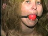 ONE BABE TAPE BOUND, BALL-GAGGED & DROOLING (D26-3)