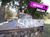 Nathalie poses on a Hotchkiss armored personnel carrier