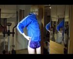 Sonja during her workout on the crosstrainer wearing a supersexy purple adidas shiny nylon shorts and a blue rain jacket (Video)